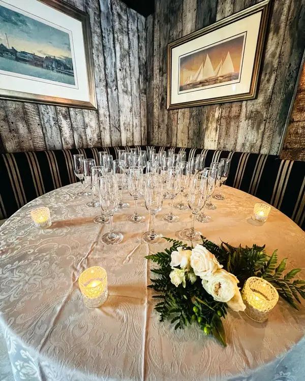 Round table set with flowers and candles