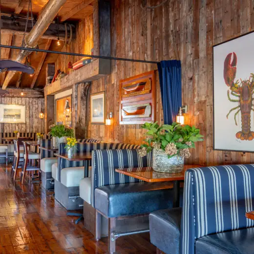 Booths and bar seating in the main dining room