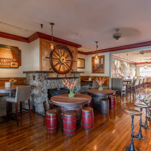 Stone fireplace and barrel stools